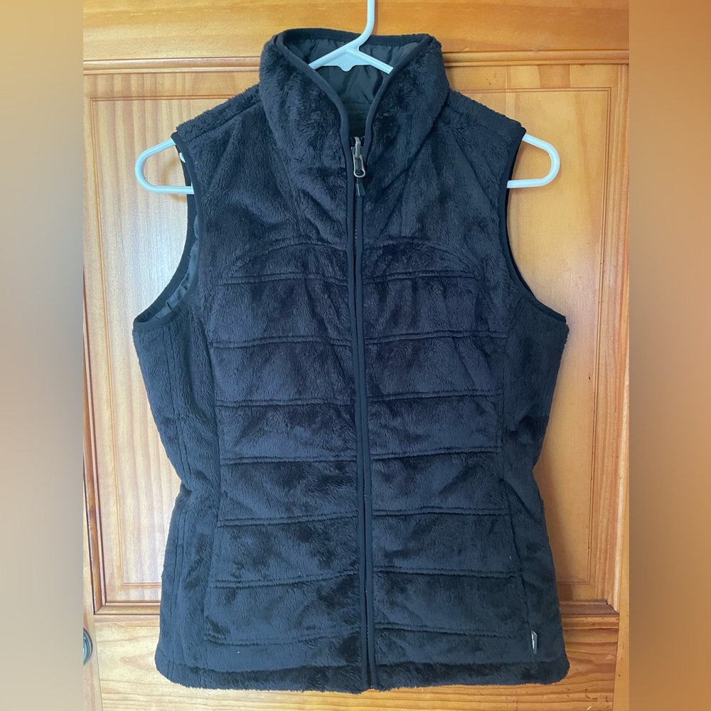 The North Face black interchangeable vest. Size small. Pockets inside and out
